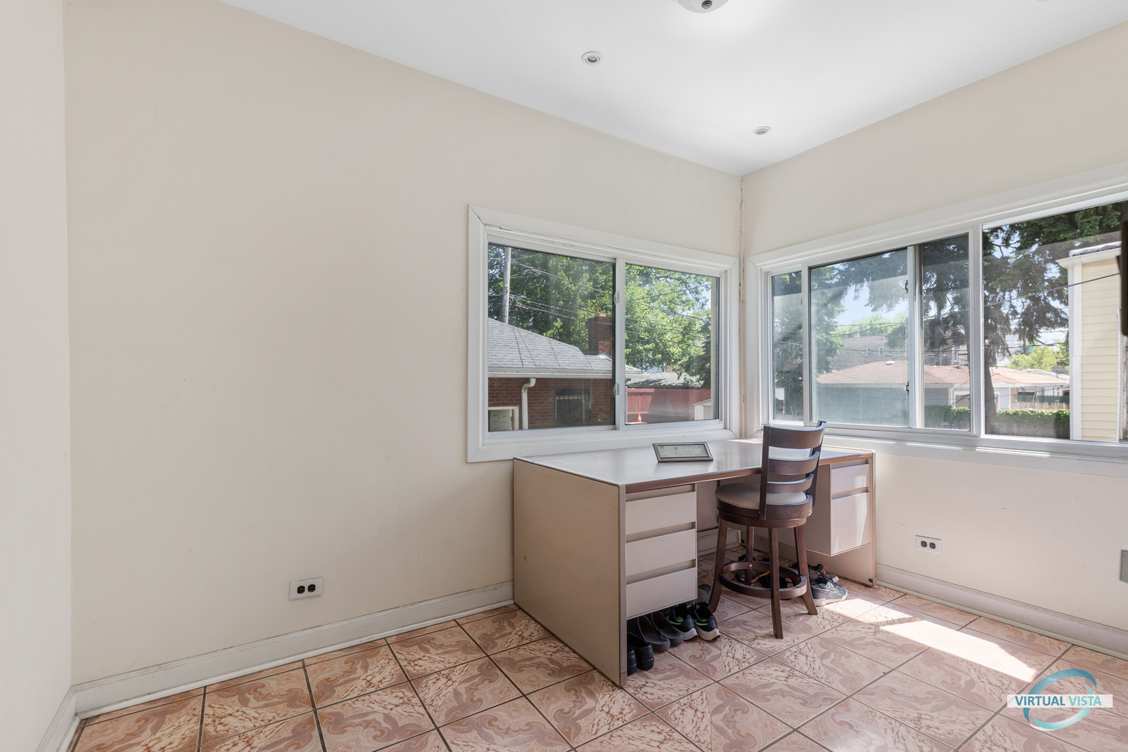 1521 North Springfield Avenue Chicago, IL 60651 - Photo 17 of 40 a view of a workspace with furniture and a window