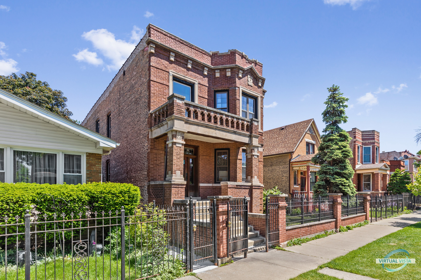 1521 North Springfield Avenue Chicago, IL 60651 - Photo 2 of 40 front view of house with a yard