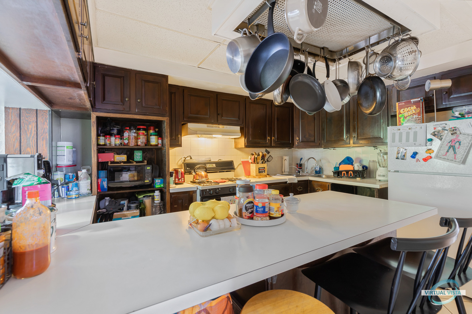 1521 North Springfield Avenue Chicago, IL 60651 - Photo 22 of 40 a kitchen with a table chairs and a stove