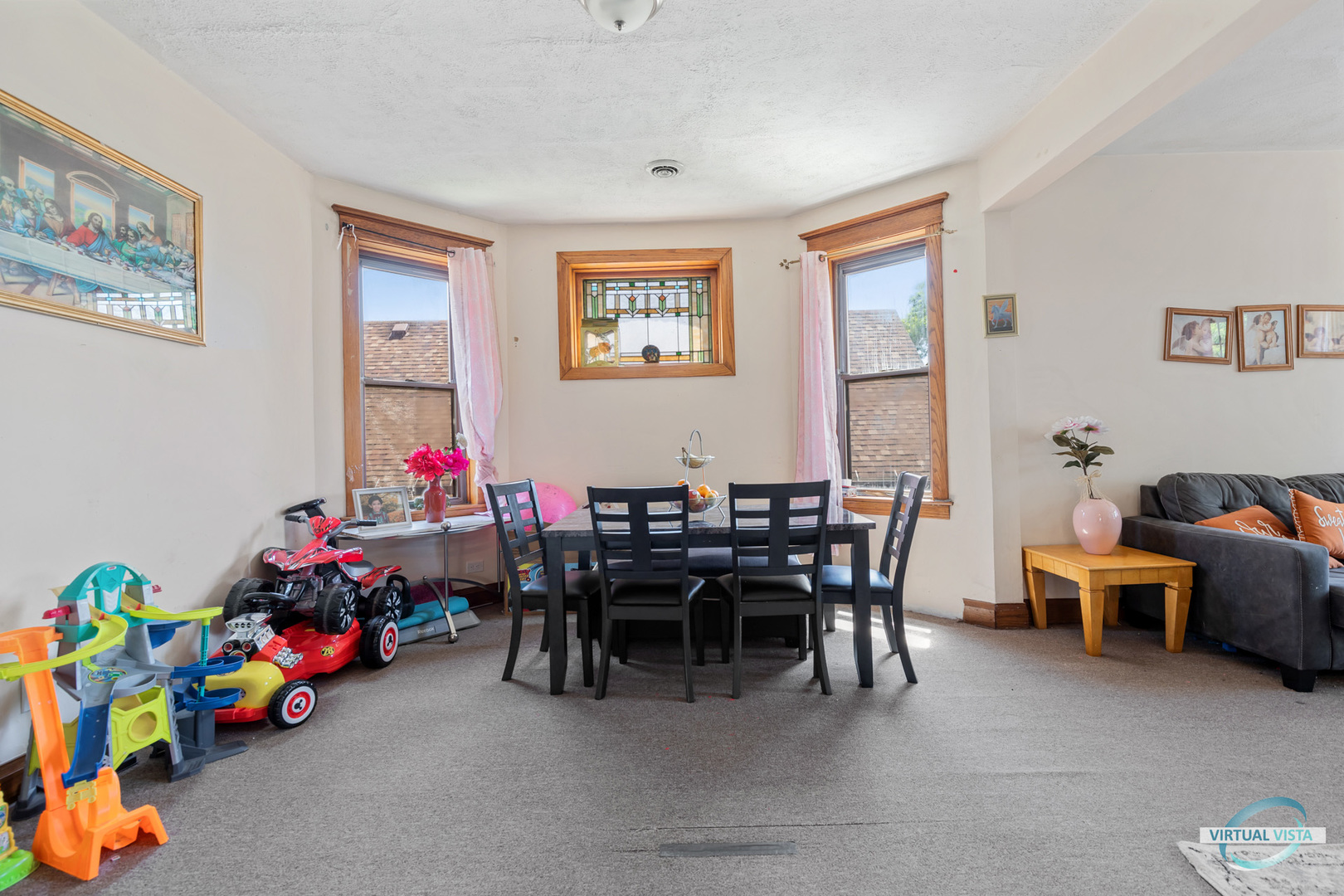1521 North Springfield Avenue Chicago, IL 60651 - Photo 26 of 40 a view of a dining room with furniture and toys