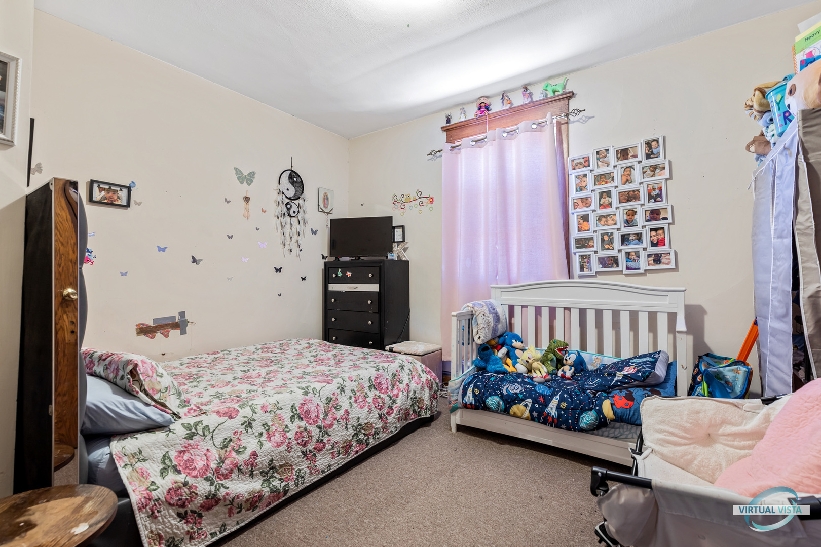 1521 North Springfield Avenue Chicago, IL 60651 - Photo 32 of 40 a bedroom with bed and a window