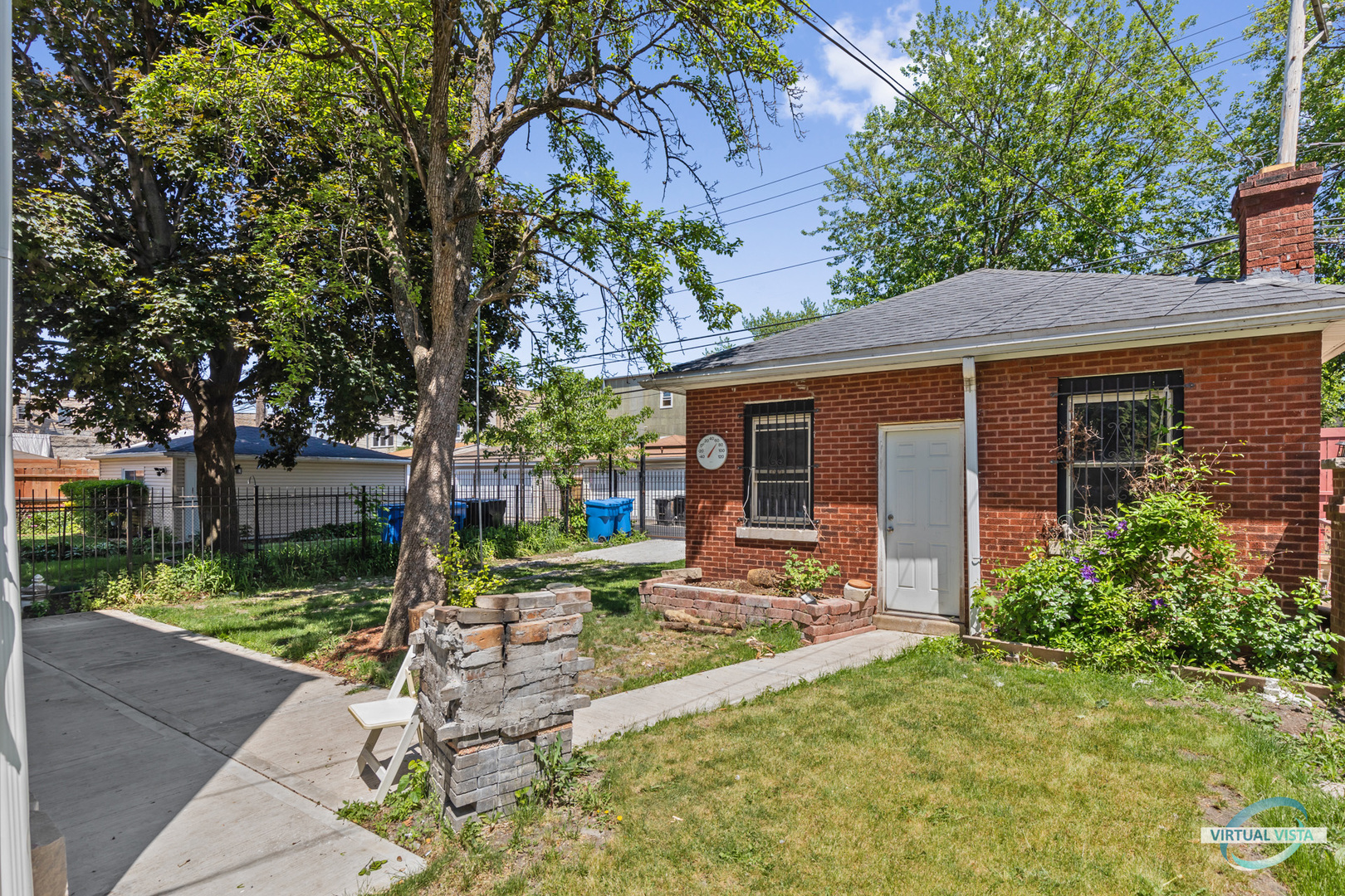 1521 North Springfield Avenue Chicago, IL 60651 - Photo 40 of 40 front view of a house with a yard