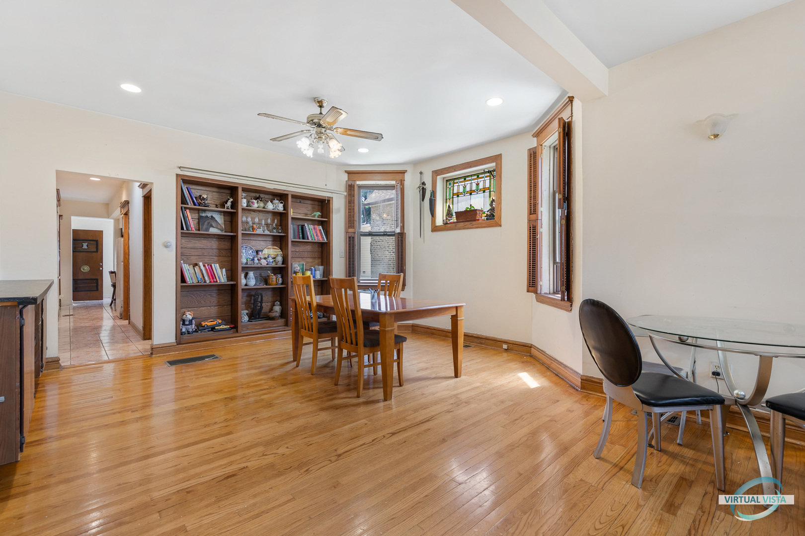 1521 North Springfield Avenue Chicago, IL 60651 - Photo 4 of 40 a view of a dining room with furniture and wooden floor