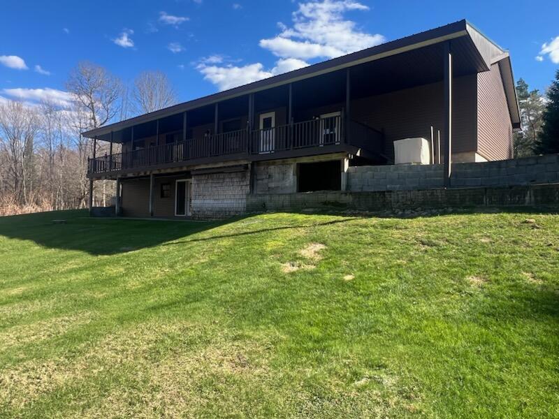 243 County Rte 14 St. Regis Falls, NY 12980 - Photo 6 of 55 Back