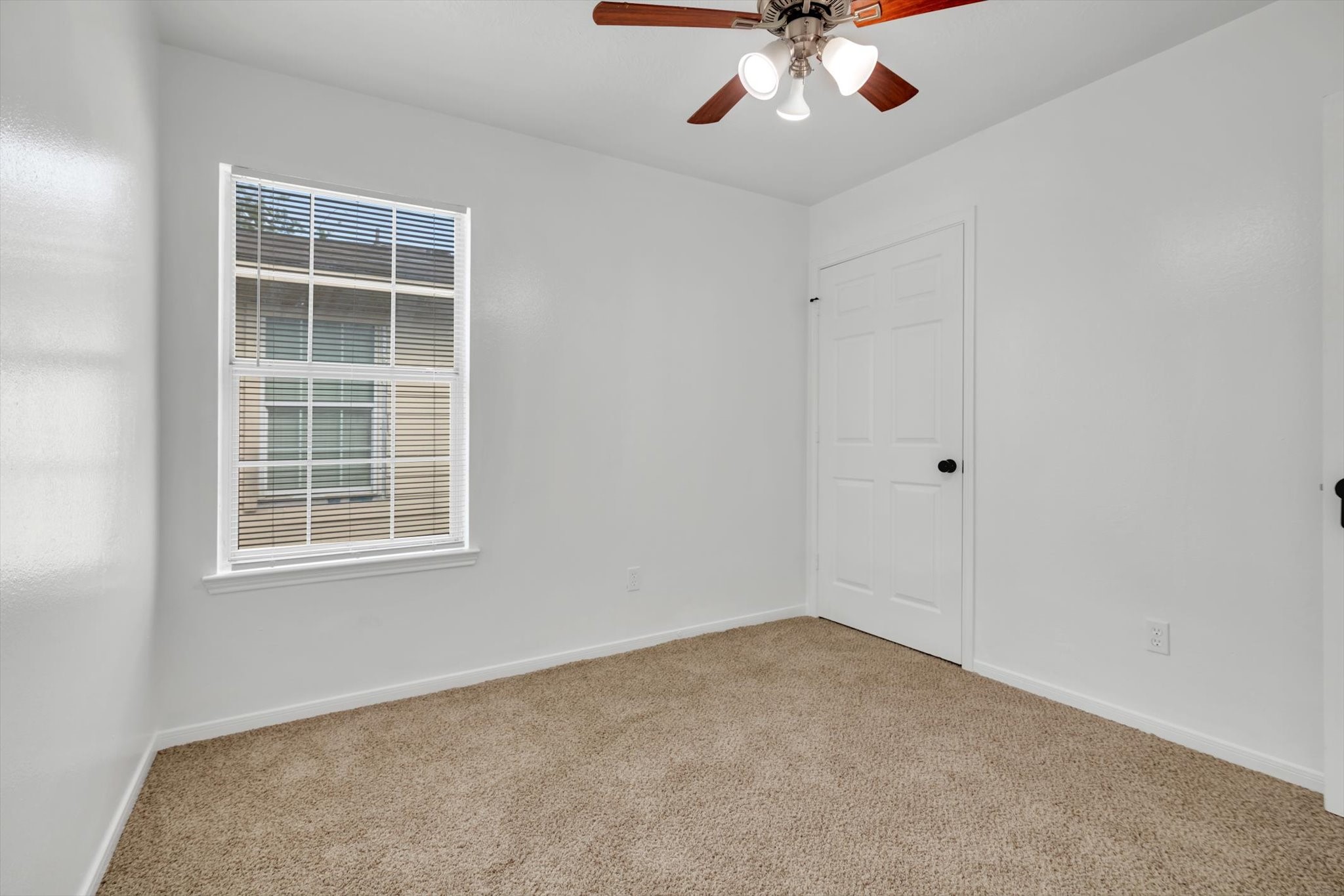 6933 Liverpool Street, Unit A Houston, TX 77021 - Photo 16 of 49 an empty room with a window