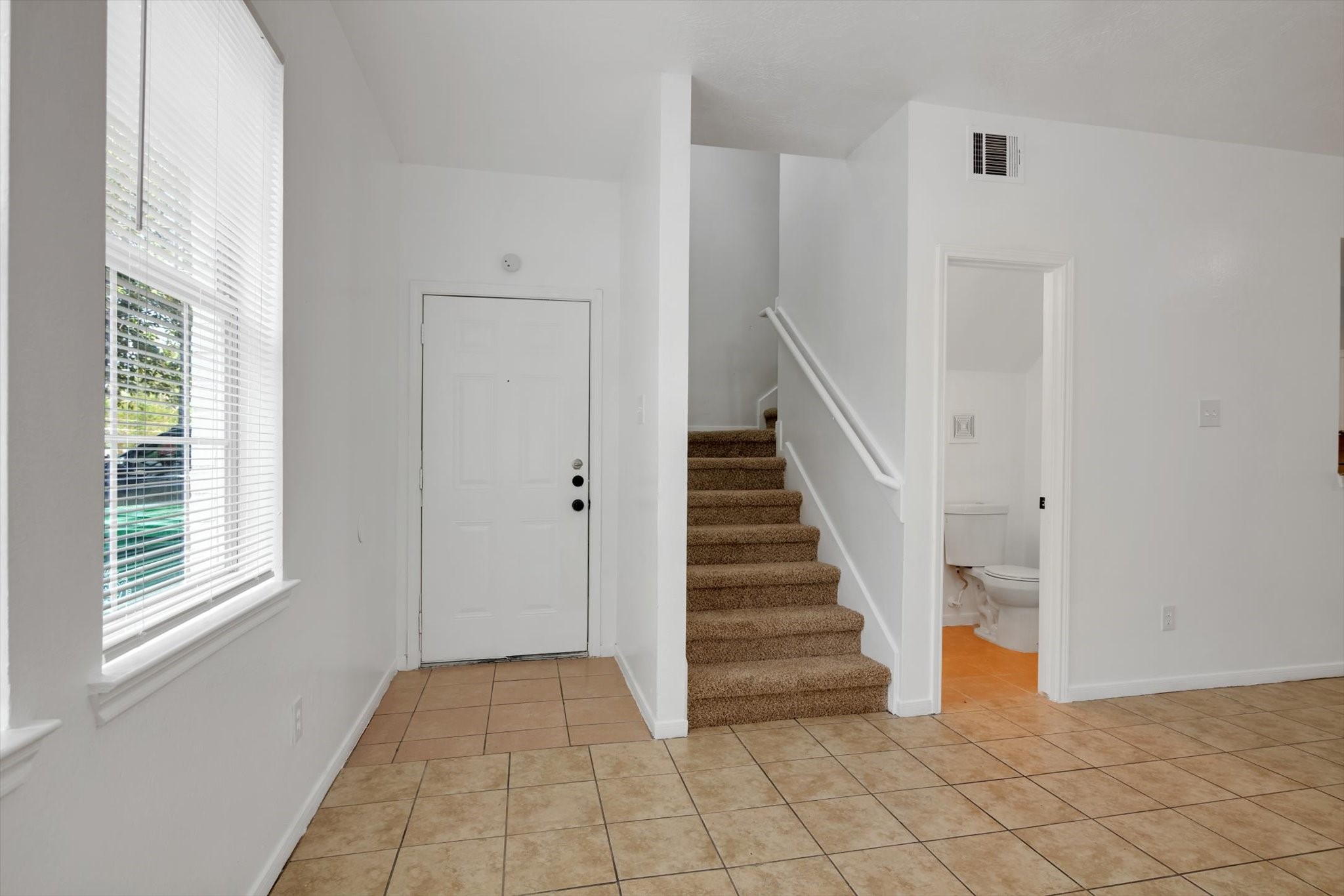 6933 Liverpool Street, Unit A Houston, TX 77021 - Photo 24 of 49 a view of entryway with stairs