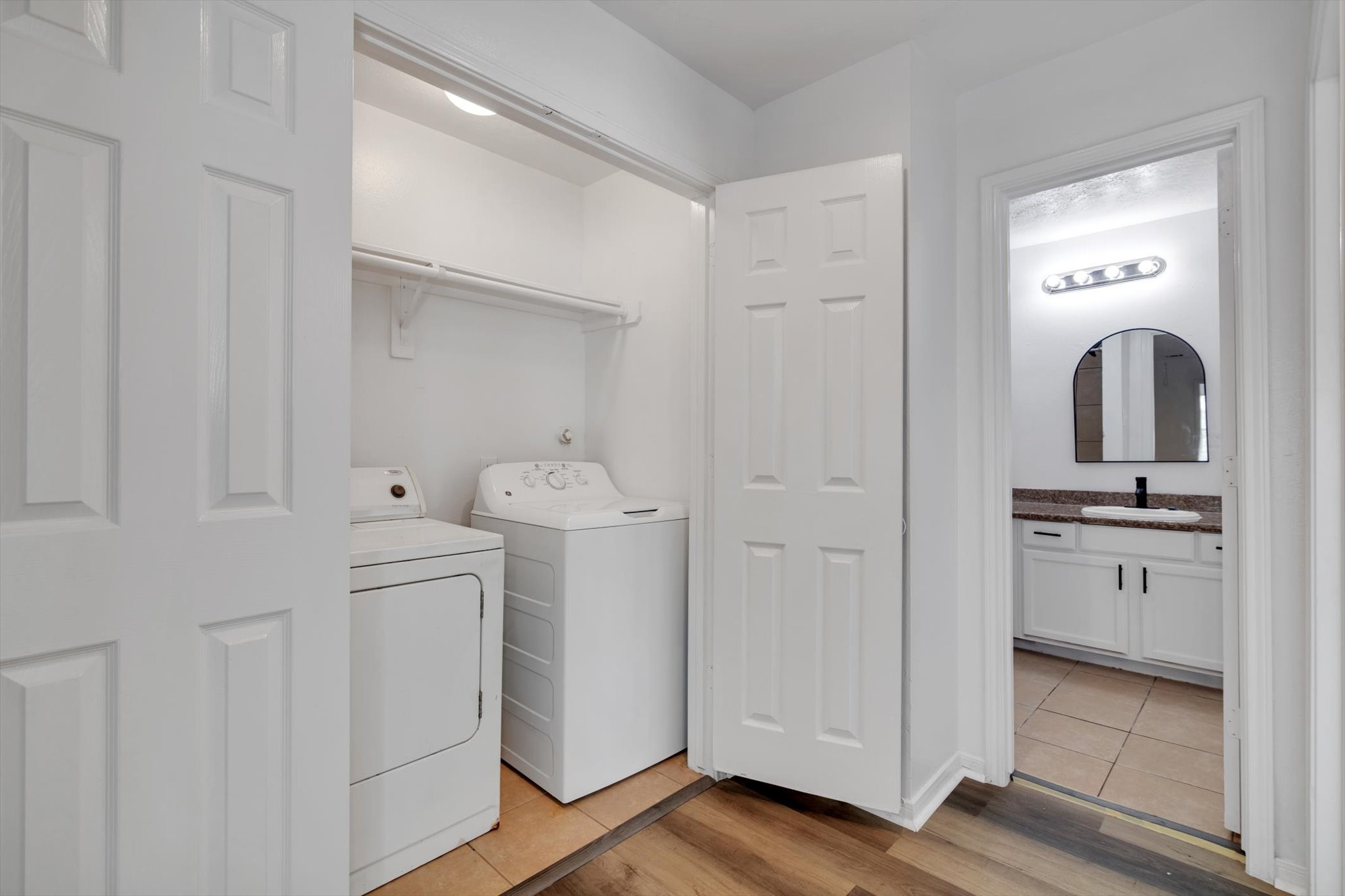 6933 Liverpool Street, Unit A Houston, TX 77021 - Photo 28 of 49 a room with white cabinets and sink