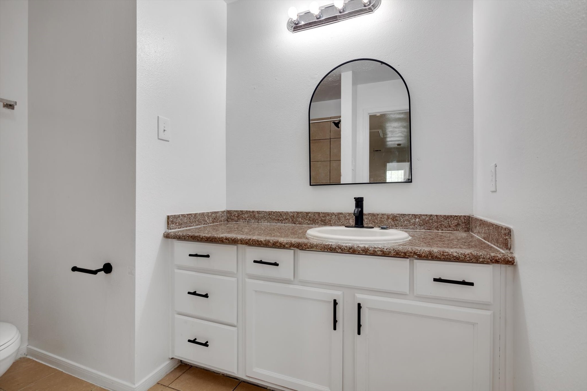 6933 Liverpool Street, Unit A Houston, TX 77021 - Photo 35 of 49 a close view of a sink and tap