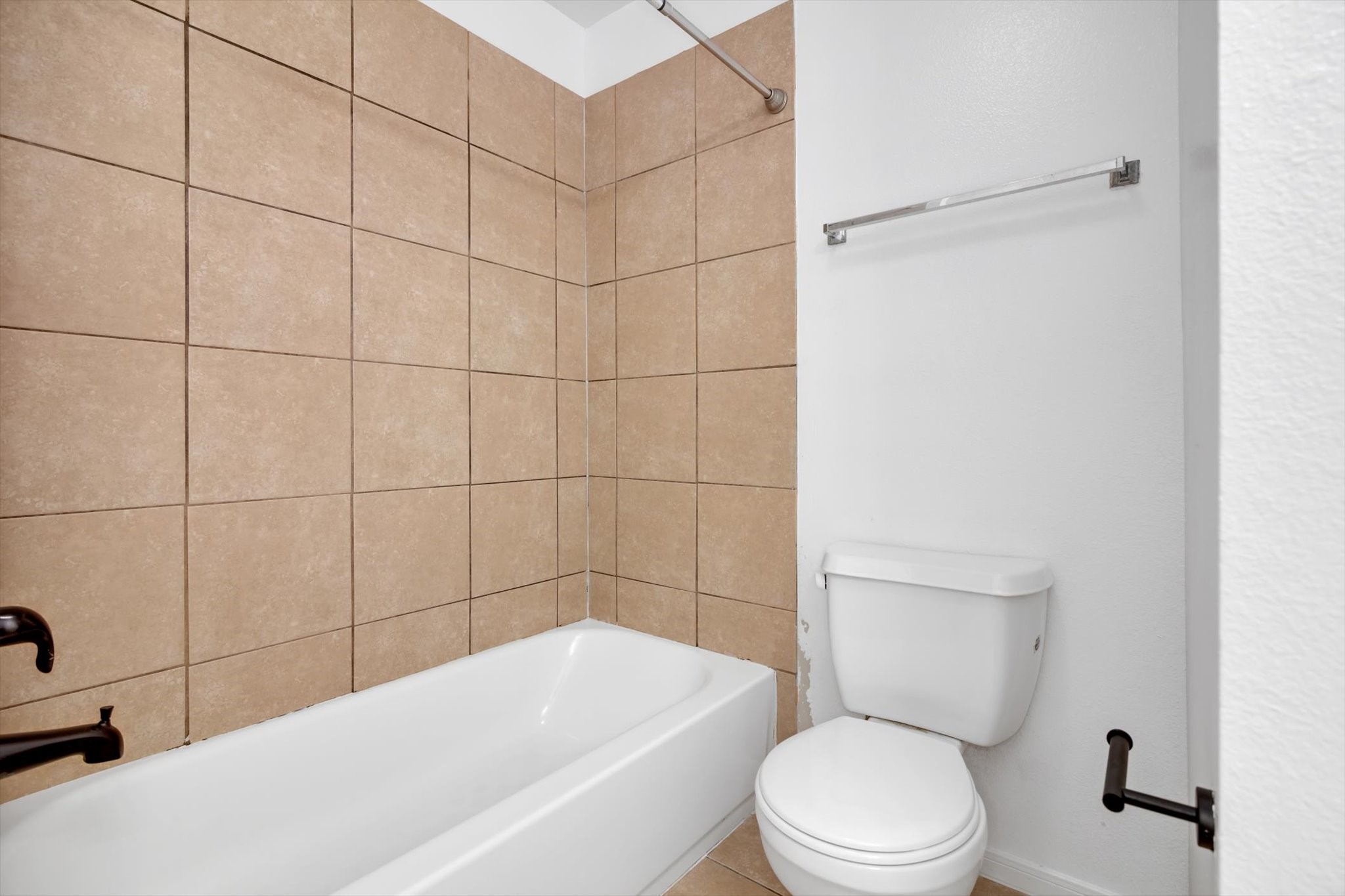 6933 Liverpool Street, Unit A Houston, TX 77021 - Photo 36 of 49 a bathroom with a toilet and shower
