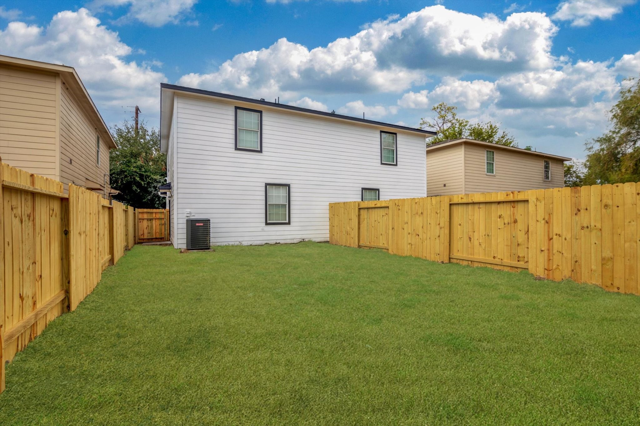 6933 Liverpool Street, Unit A Houston, TX 77021 - Photo 48 of 49 a view of a backyard with plants