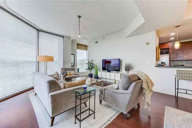a bathroom with a toilet a sink and a mirror