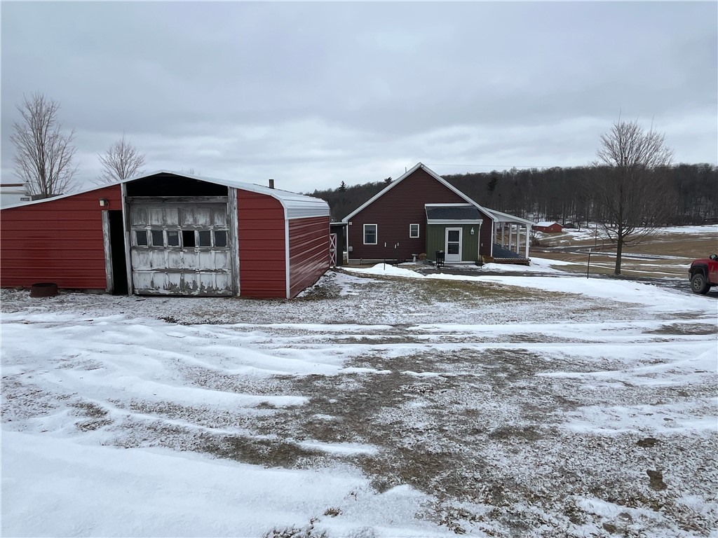323 Cooper Hill Road Van Etten, NY 14889 - Photo 4 of 47 Side of house and woodshed/ garage