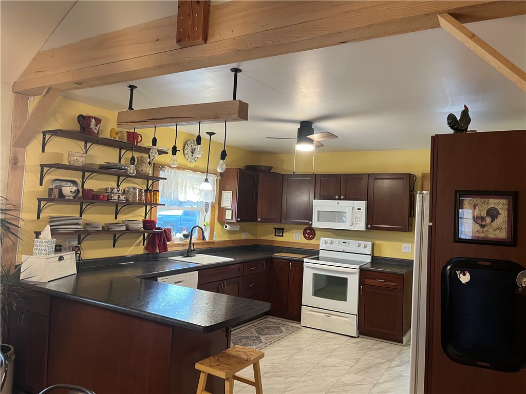 323 Cooper Hill Road Van Etten, NY 14889 - Photo 8 of 47 Kitchen with cherry cabinets