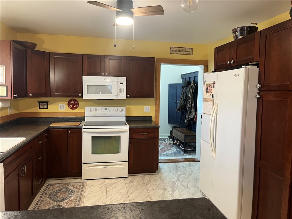 323 Cooper Hill Road Van Etten, NY 14889 - Photo 9 of 47 Kitchen has pull-outs in cupboards
