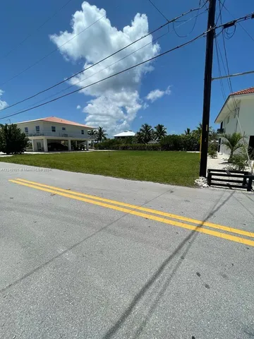 a view of swimming pool with an outdoor seating