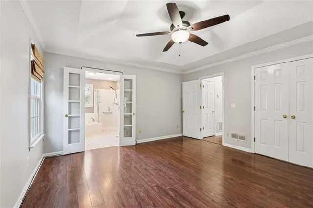 a bathroom with a sink a shower and a mirror