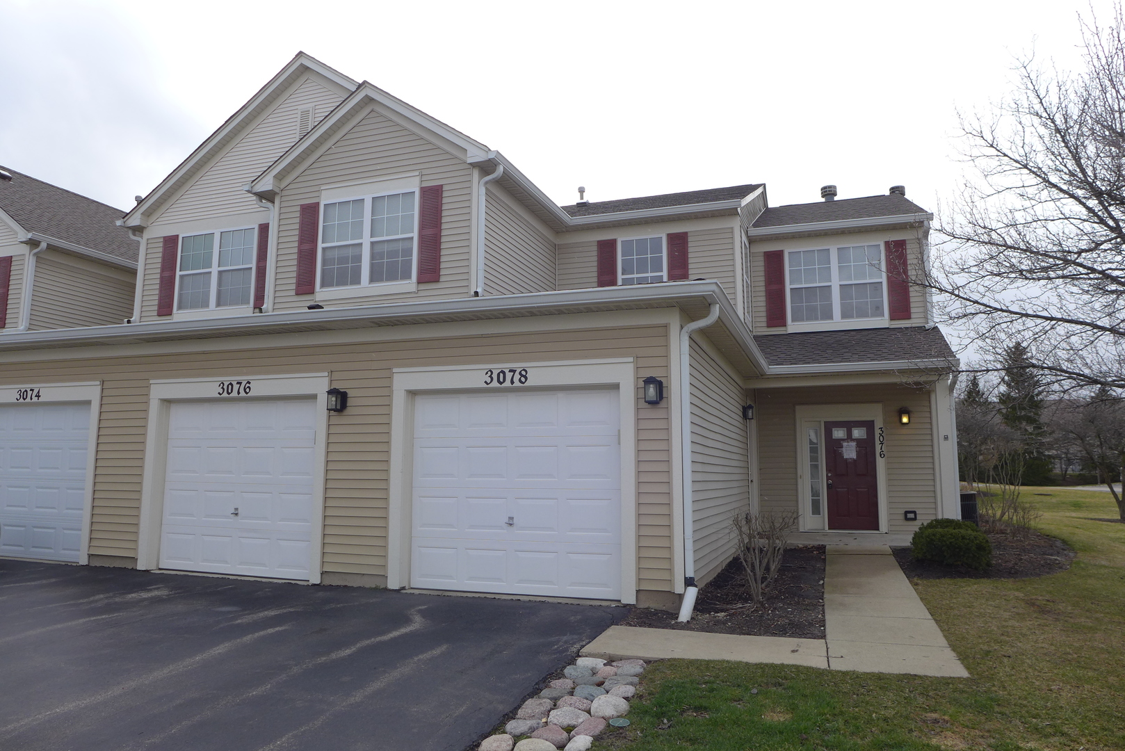 3076 Falling Waters Lane Lindenhurst, IL 60046 - Photo 1 of 15 a view of a house with garage and barbeque oven