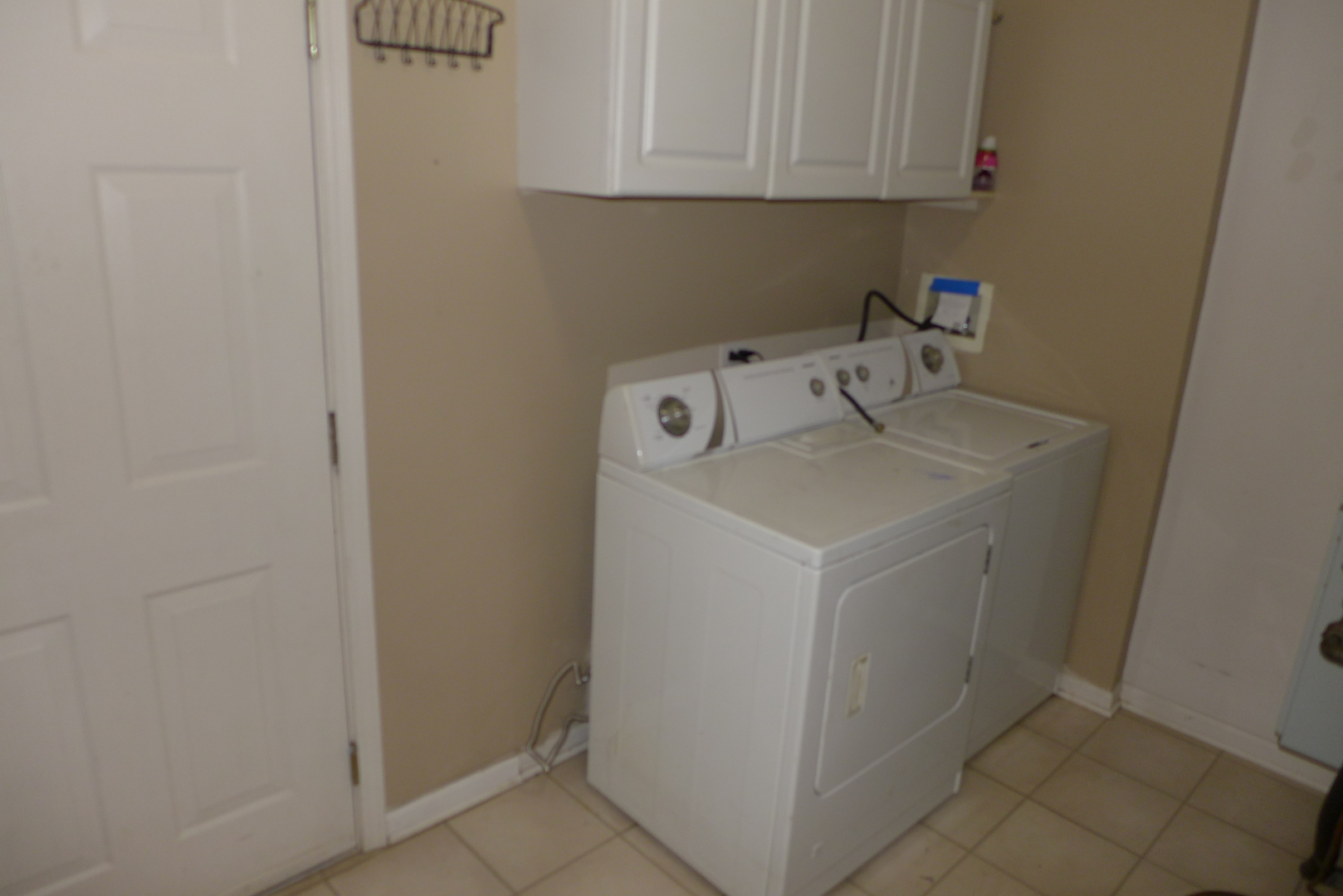 3076 Falling Waters Lane Lindenhurst, IL 60046 - Photo 15 of 15 a utility room with dryer and washer