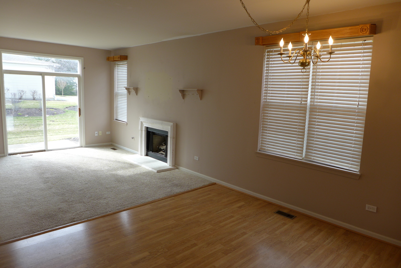 3076 Falling Waters Lane Lindenhurst, IL 60046 - Photo 5 of 15 a view of a livingroom with a chandelier