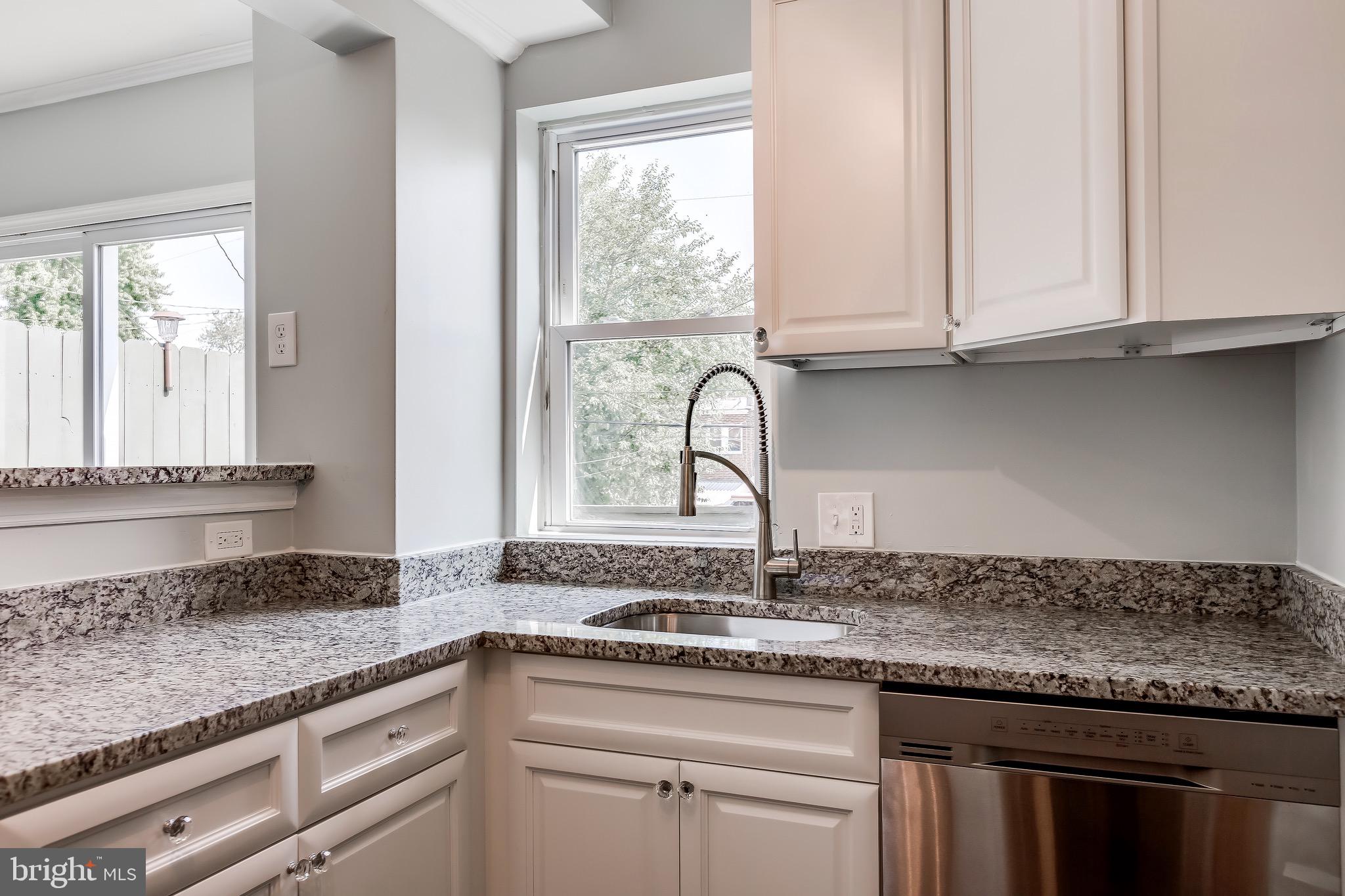 228 West Edgevale Road Baltimore, MD 21225 - Photo 13 of 39 Updated Cabinets and Granite Countertops.