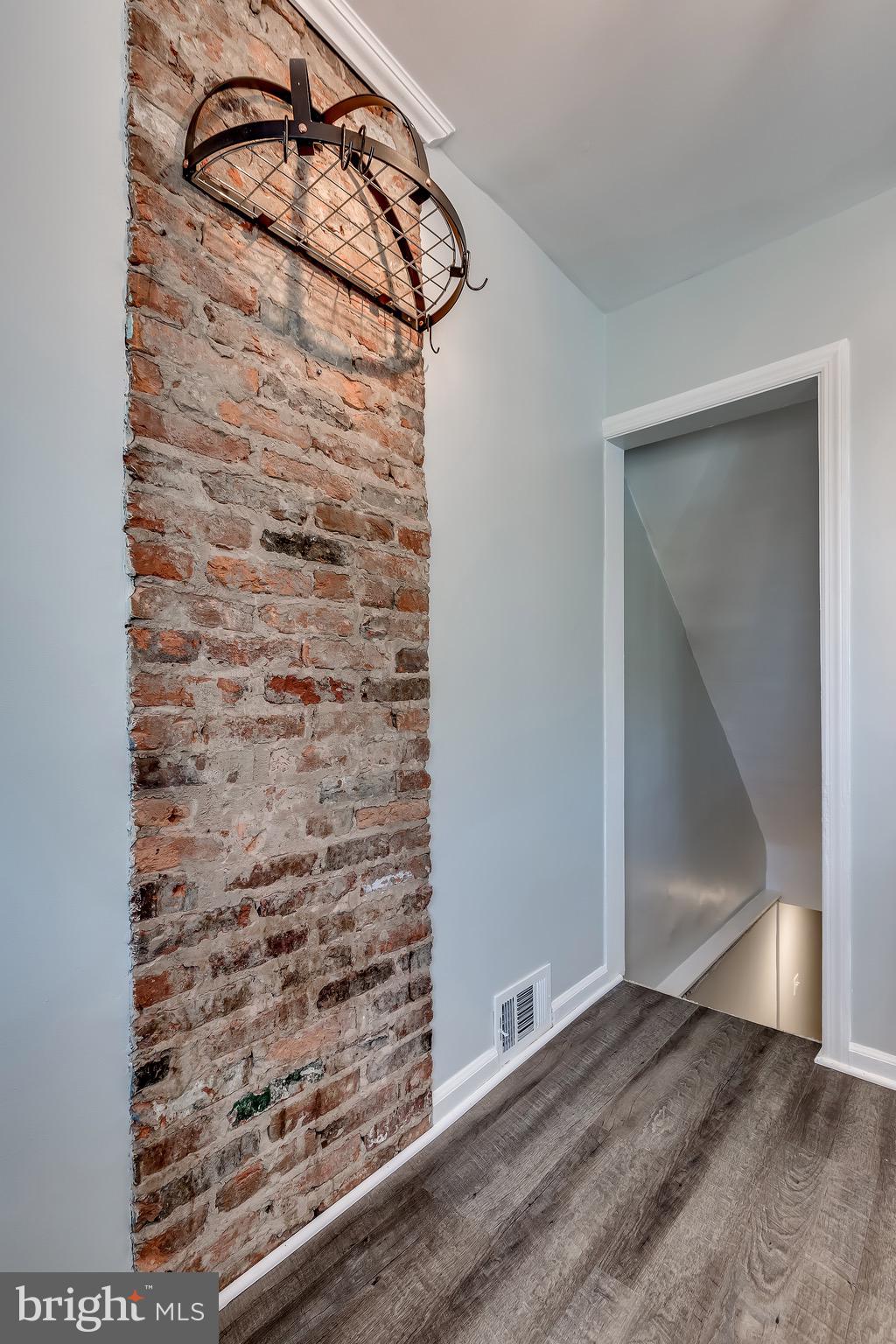 228 West Edgevale Road Baltimore, MD 21225 - Photo 15 of 39 Brick molding blended with modern updates.