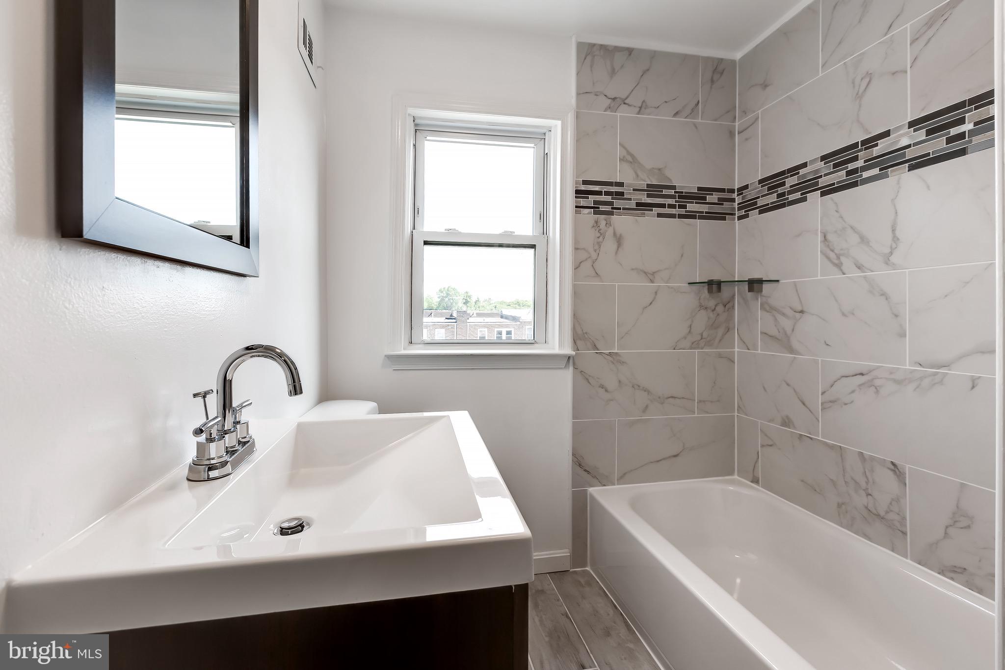 228 West Edgevale Road Baltimore, MD 21225 - Photo 22 of 39 Plenty of natural lights