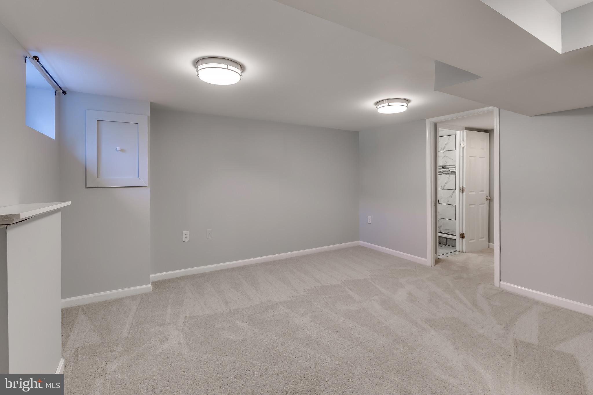 228 West Edgevale Road Baltimore, MD 21225 - Photo 30 of 39 Basement Recreation/Entertainment Space
