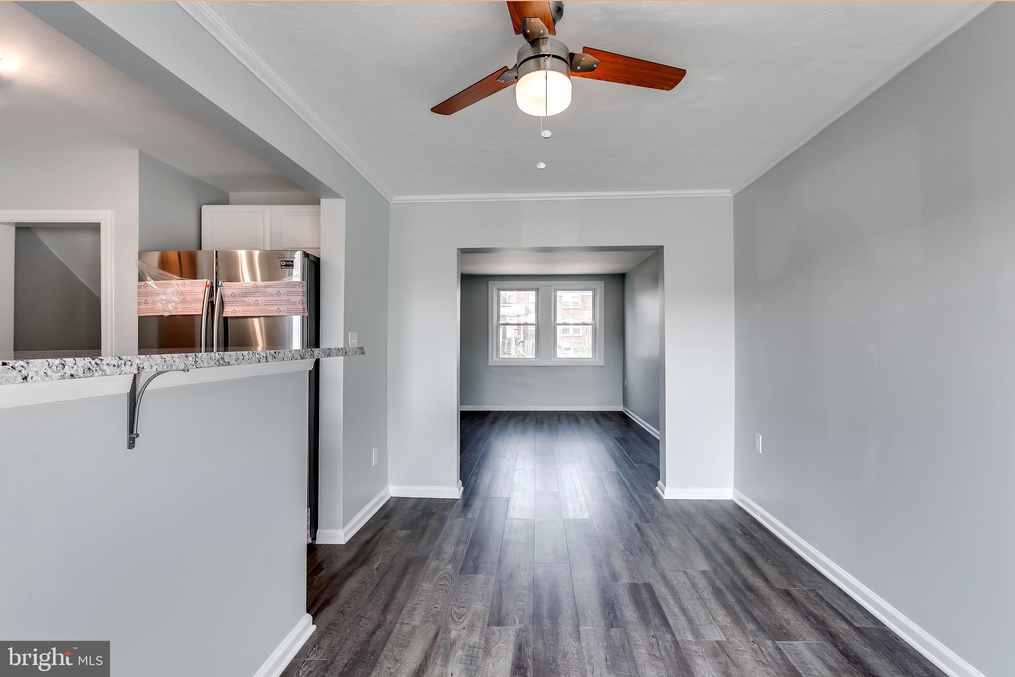 228 West Edgevale Road Baltimore, MD 21225 - Photo 10 of 39 View into the living room from dining.