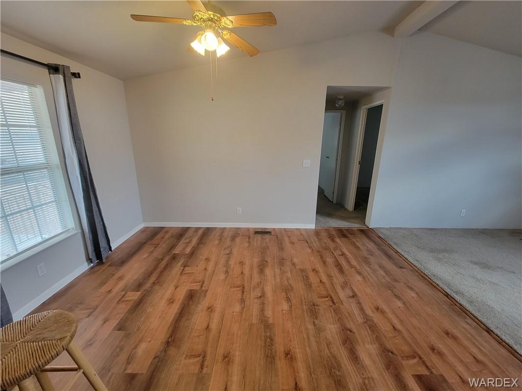3469 Bouse Road Golden Valley, AZ 86413 - Photo 14 of 37 a view of empty room with wooden floor