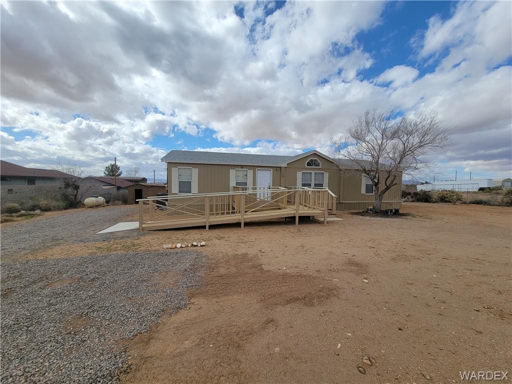 3469 Bouse Road Golden Valley, AZ 86413 - Photo 3 of 37 a view of house with a yard