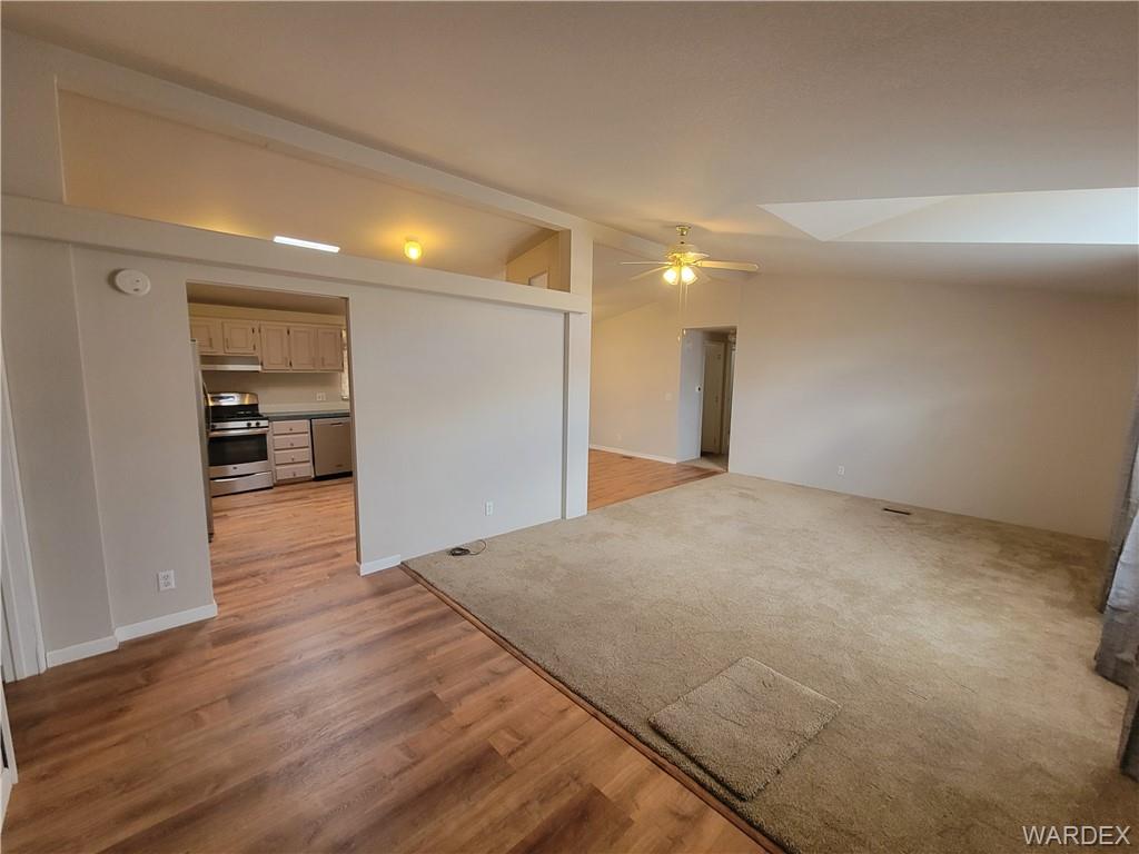 3469 Bouse Road Golden Valley, AZ 86413 - Photo 8 of 37 a view of empty room with wooden floor