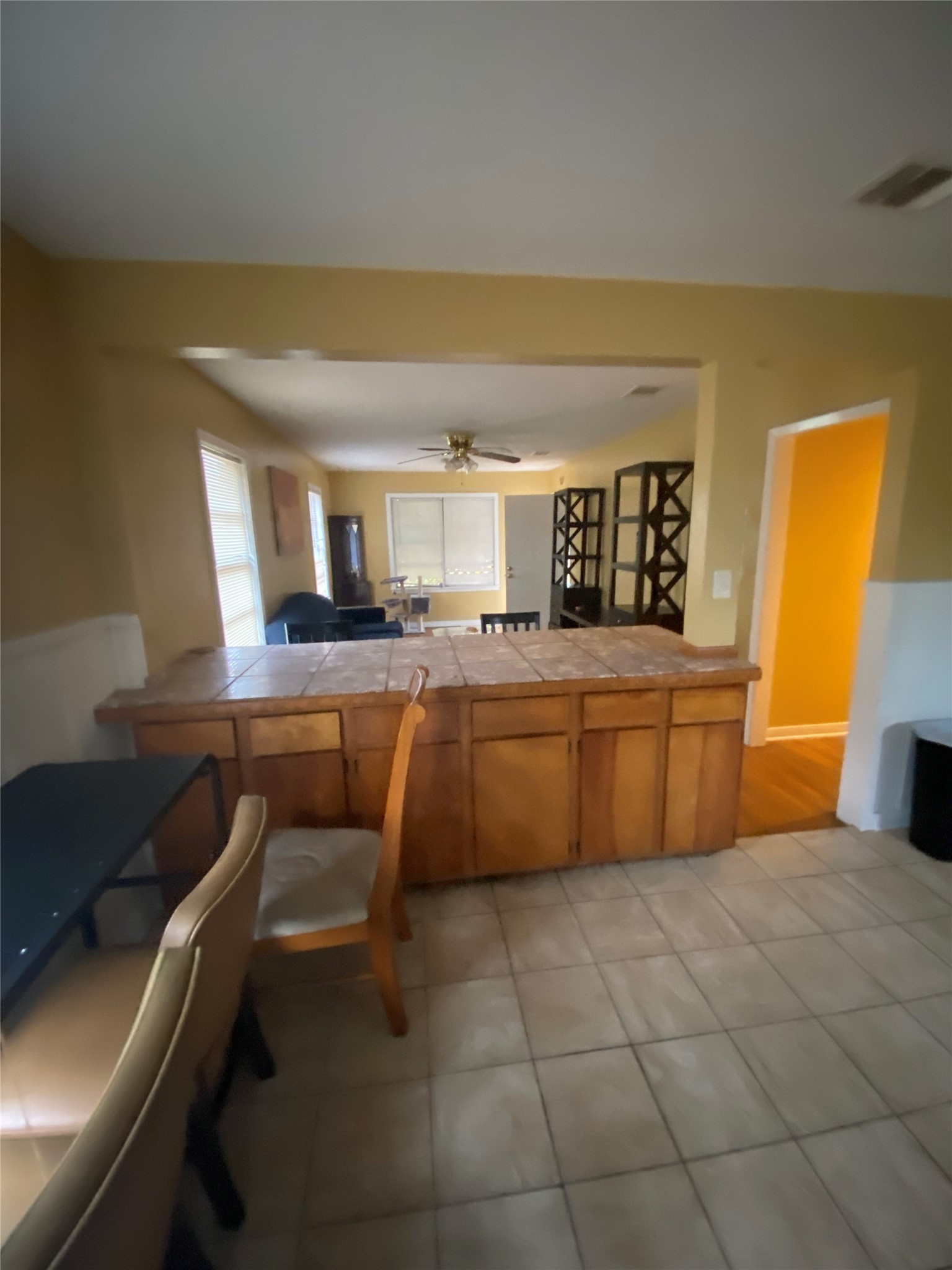 2504 Pennington Street Houston, TX 77093 - Photo 3 of 9 a kitchen with granite countertop a sink and white cabinets
