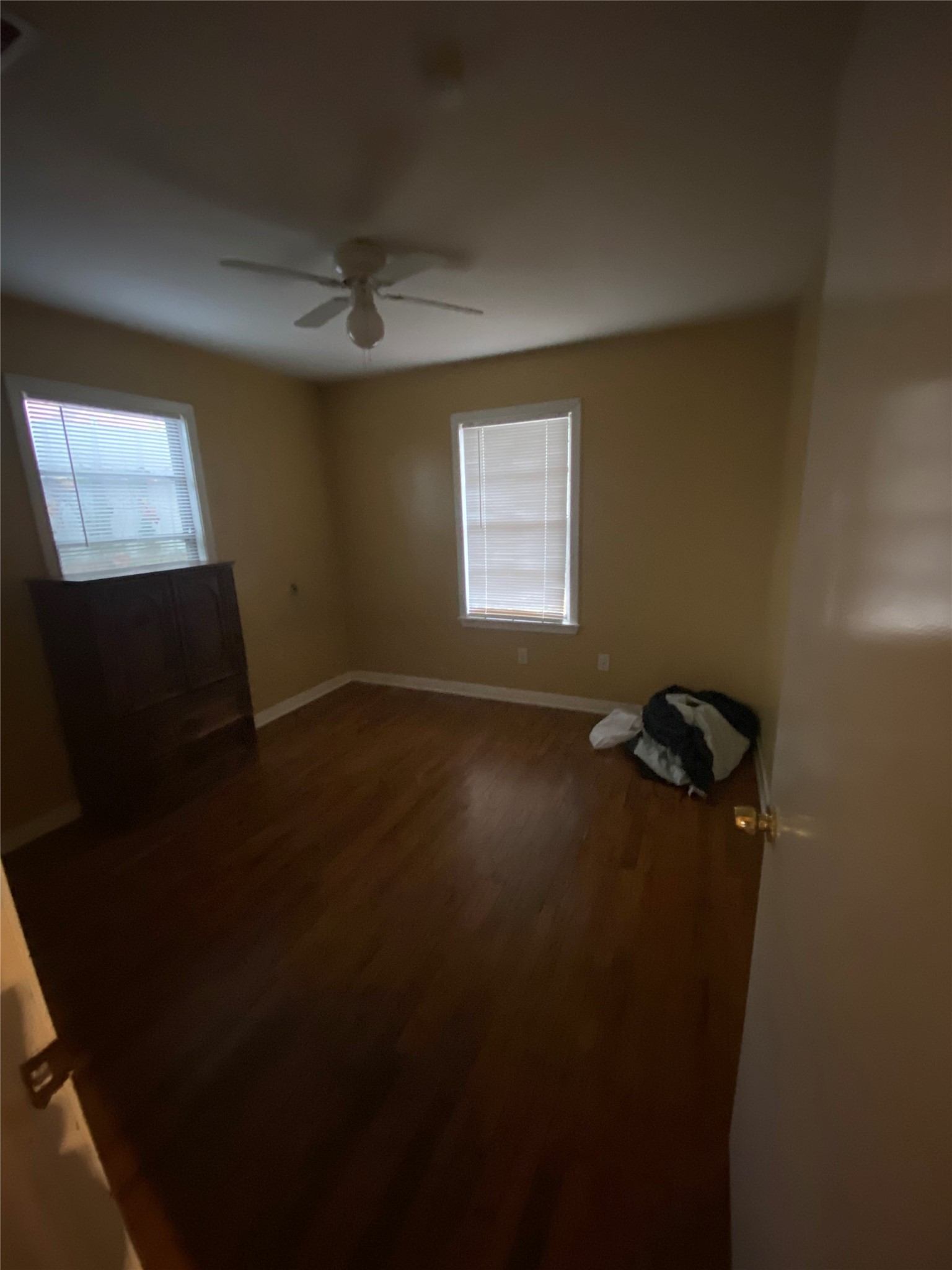 2504 Pennington Street Houston, TX 77093 - Photo 6 of 9 a view of room with hardwood floor and window