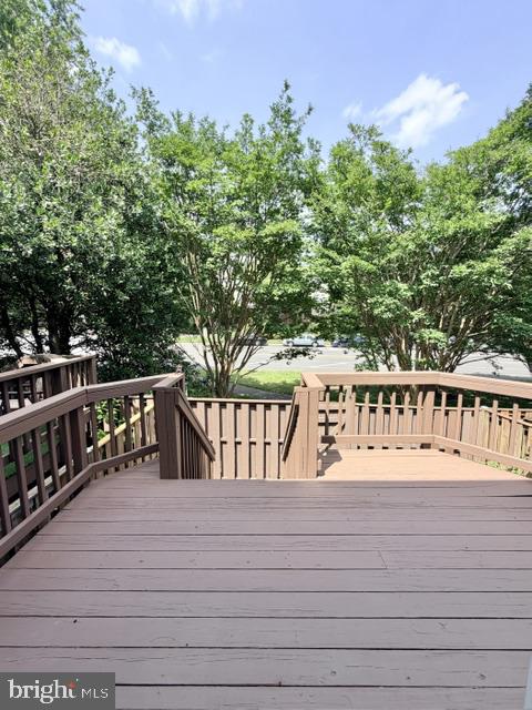 45572 Whitcomb Square Sterling, VA 20166 - Photo 32 of 32 Serene deck with lush greenery view.