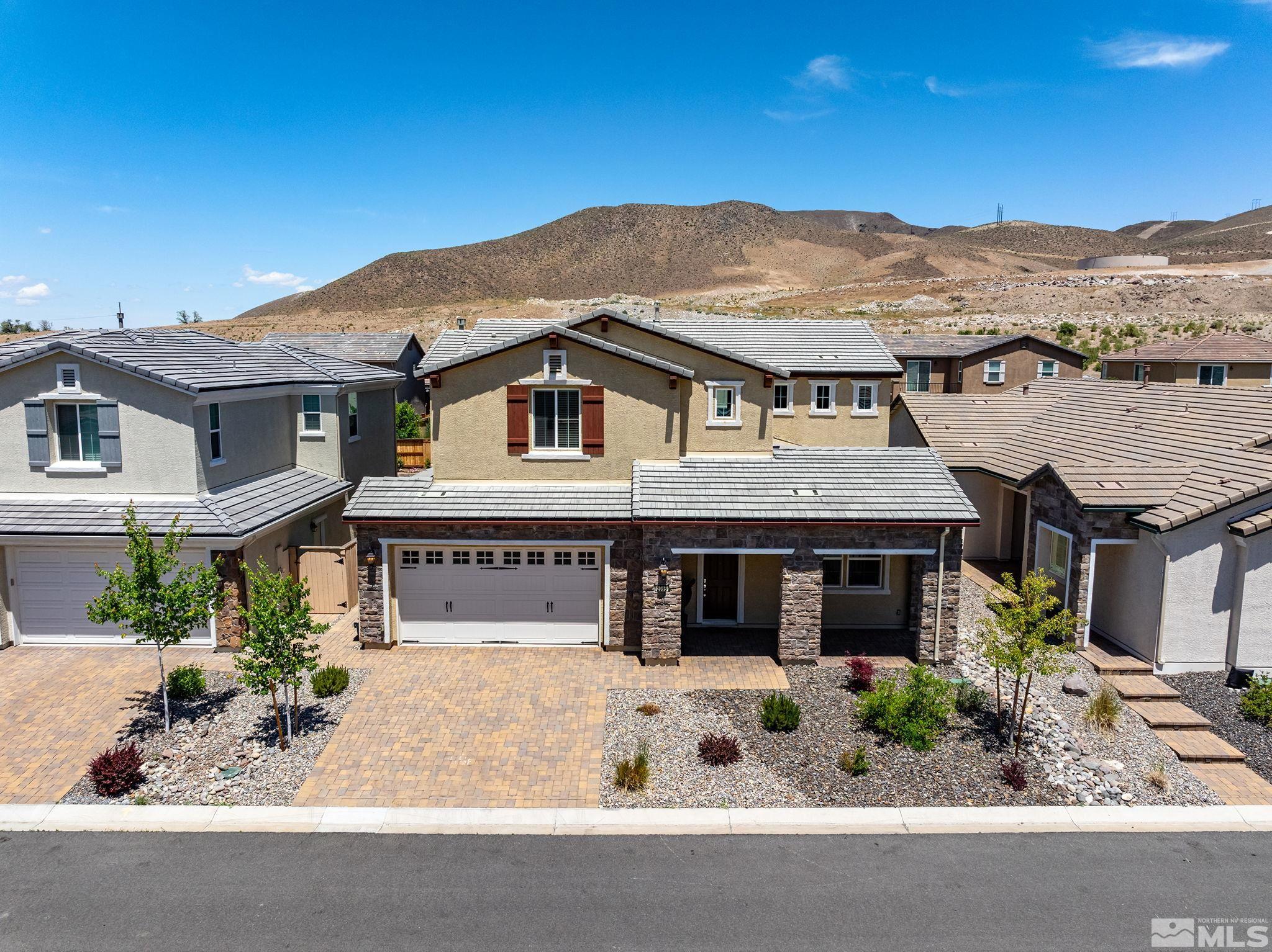 2995 Bonfire Lane Reno, NV 89521 - Photo 1 of 40 a front view of a house with a yard