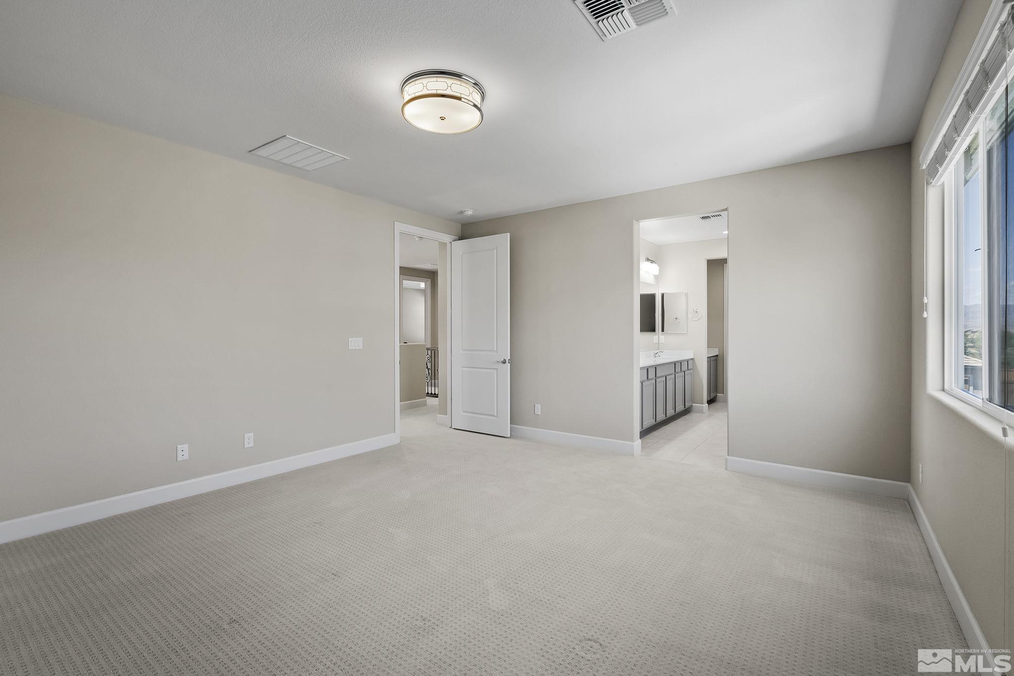 2995 Bonfire Lane Reno, NV 89521 - Photo 19 of 40 an empty room with windows
