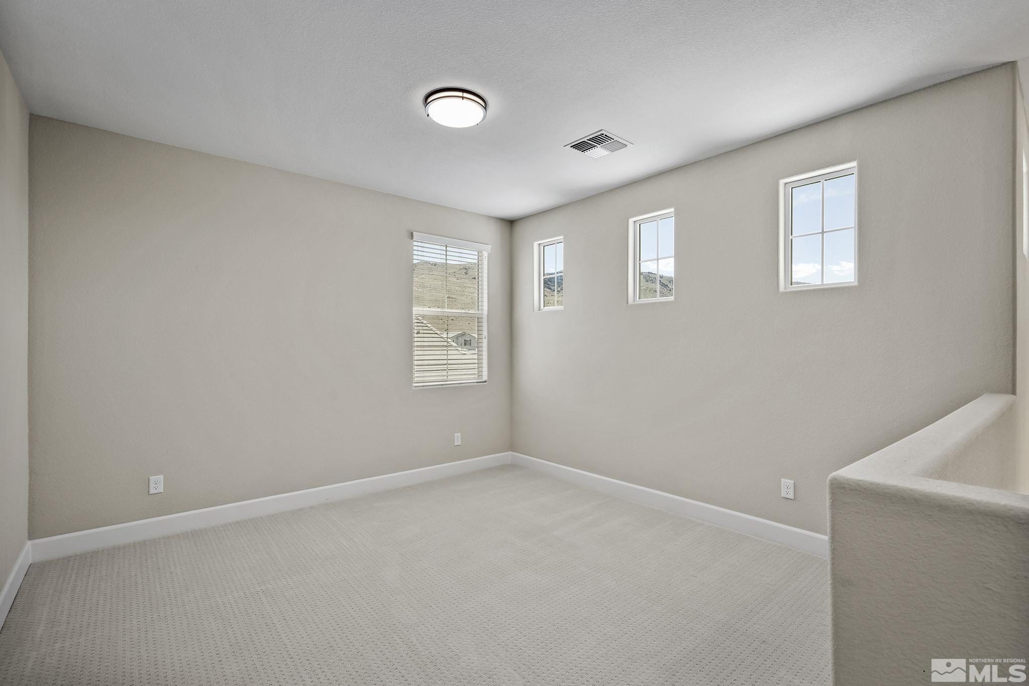 2995 Bonfire Lane Reno, NV 89521 - Photo 24 of 40 an empty room with windows