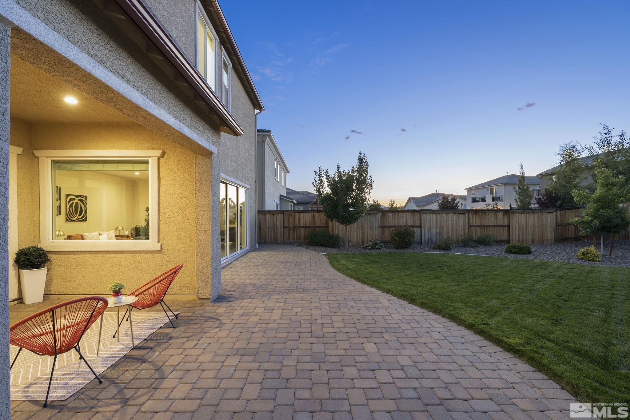 2995 Bonfire Lane Reno, NV 89521 - Photo 26 of 40 a view of a house with backyard and sitting area