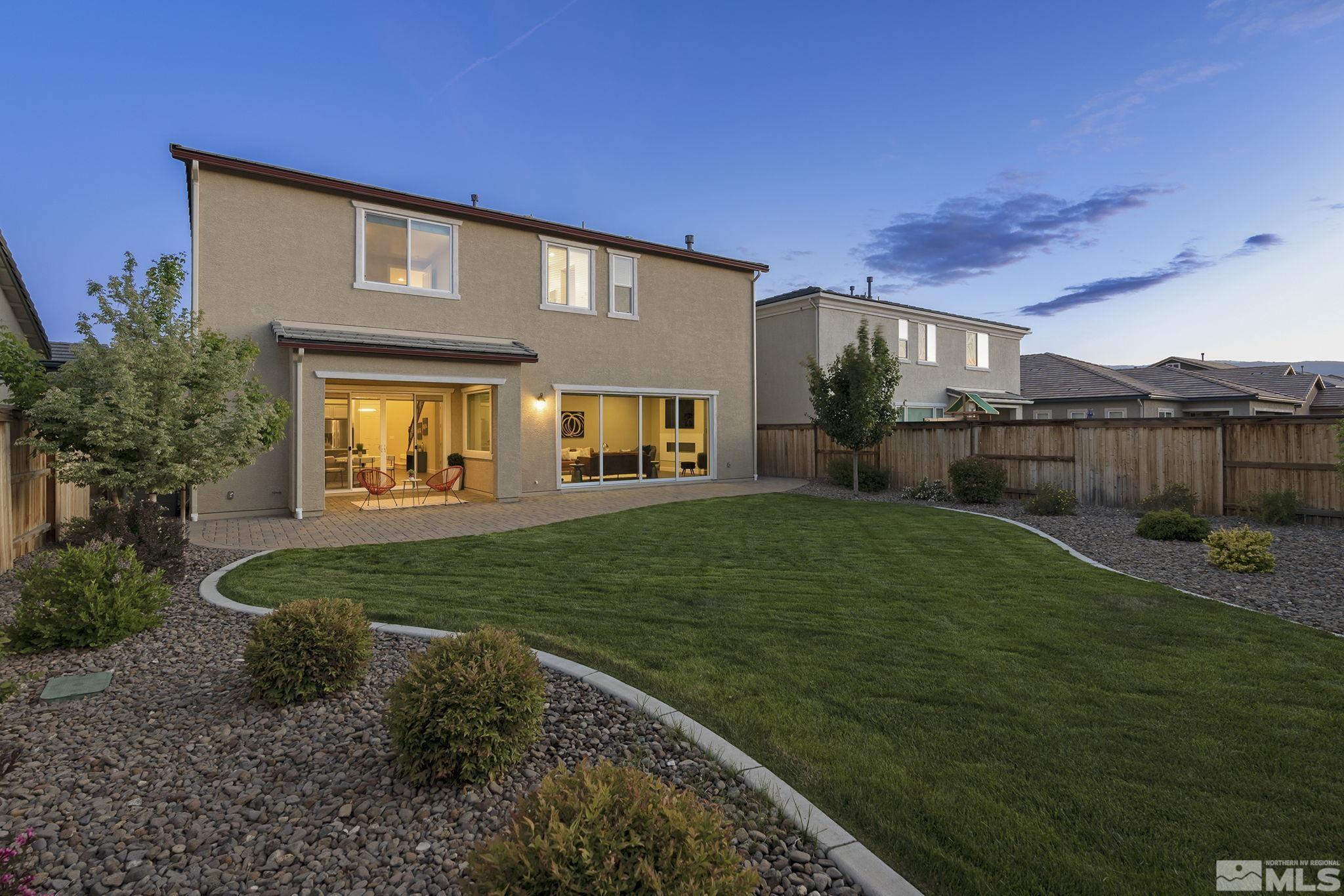 2995 Bonfire Lane Reno, NV 89521 - Photo 29 of 40 a front view of a house with a yard