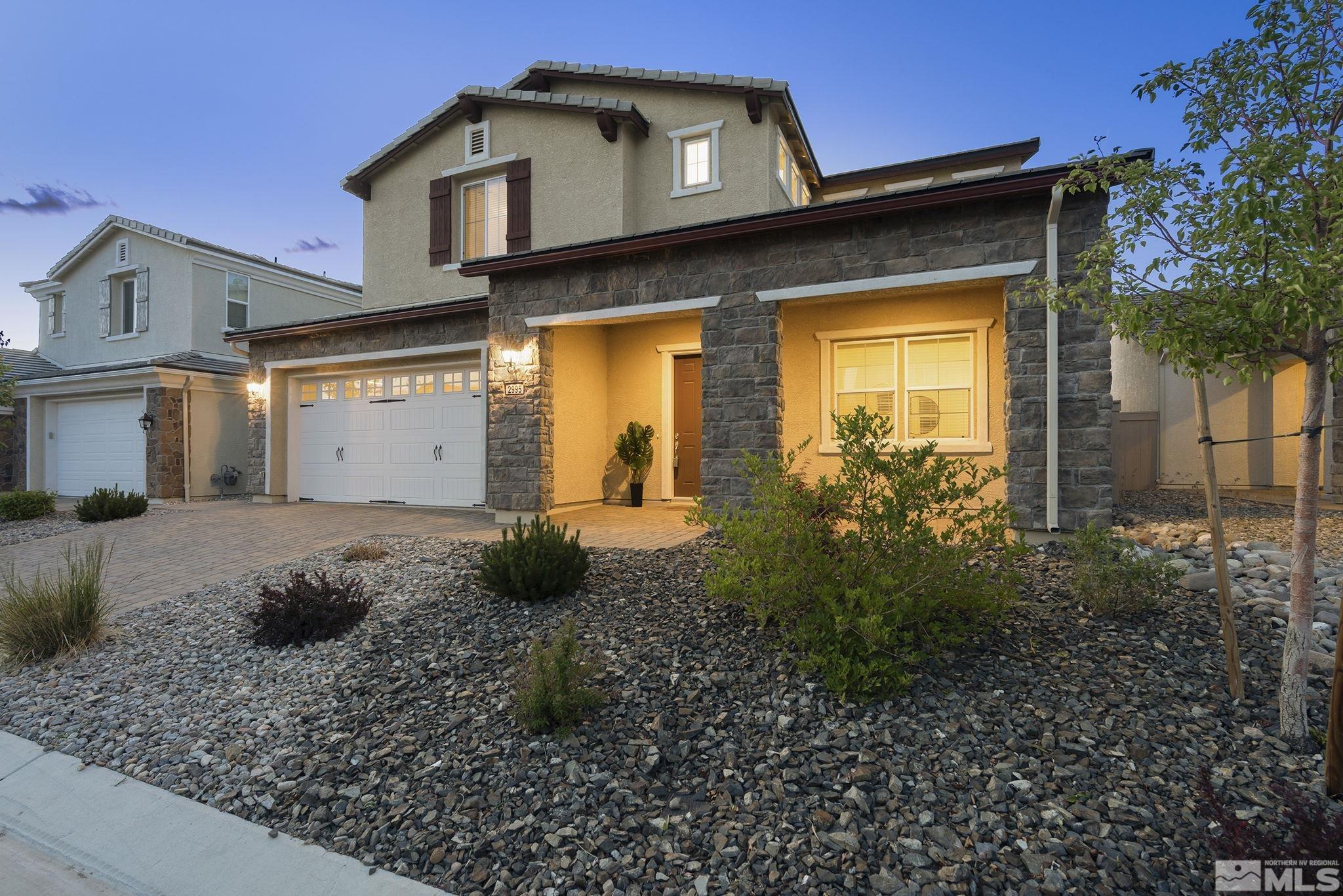 2995 Bonfire Lane Reno, NV 89521 - Photo 4 of 40 a front view of a house with garden