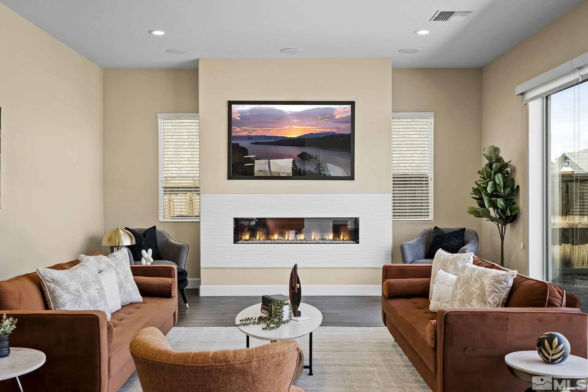 2995 Bonfire Lane Reno, NV 89521 - Photo 10 of 40 a living room with furniture and a flat screen tv