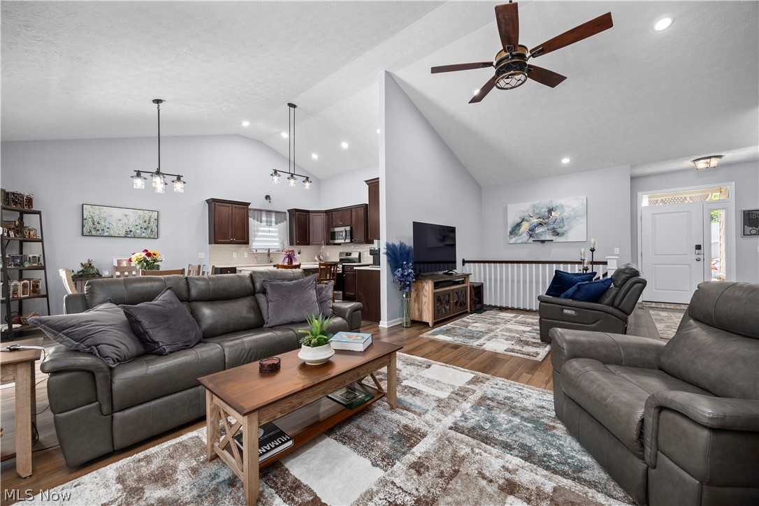 109 West Spring Drive Elyria, OH 44035 - Photo 14 of 46 Vaulted ceilings with recessed lighting and a ceiling fan define this living space