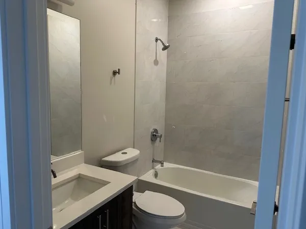 a bathroom with a sink and a toilet