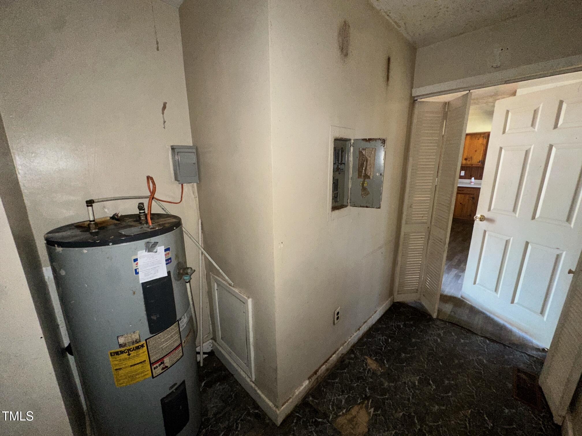 241 Cooke Circle Rich Square, NC 27869 - Photo 6 of 10 a view of walk in closet with clothes and shoes