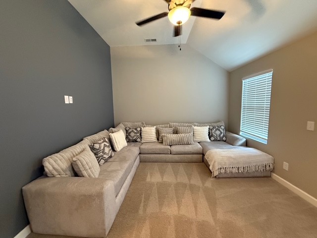 1737 Fenway Loop Antioch, TN 37013 - Photo 16 of 33 a living room with furniture and a chandelier