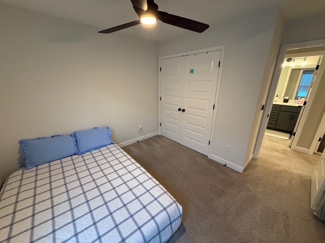 1737 Fenway Loop Antioch, TN 37013 - Photo 20 of 33 a bedroom with a bed and a ceiling fan