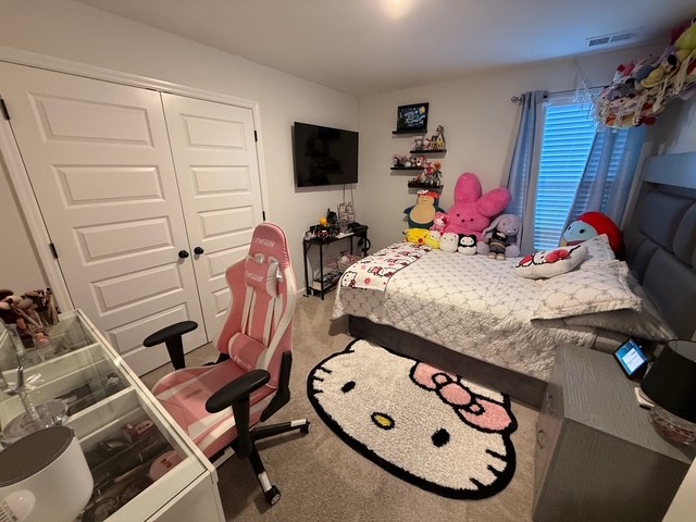 1737 Fenway Loop Antioch, TN 37013 - Photo 21 of 33 a bedroom with a bed and furniture
