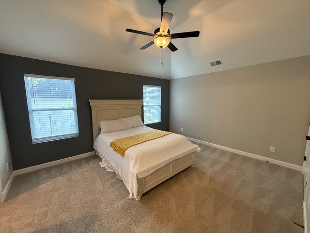 1737 Fenway Loop Antioch, TN 37013 - Photo 22 of 33 a bedroom with a bed and window