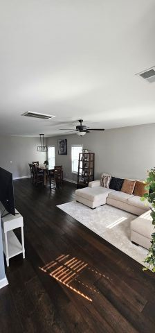 1737 Fenway Loop Antioch, TN 37013 - Photo 9 of 33 a living room with furniture and a rug