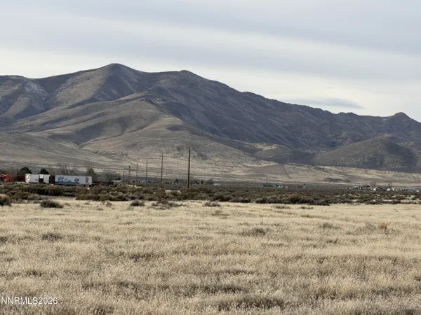 a view of a yard with a snow